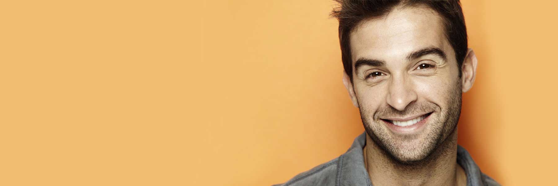 Woman smiling at dentist office in Lake Forest CA