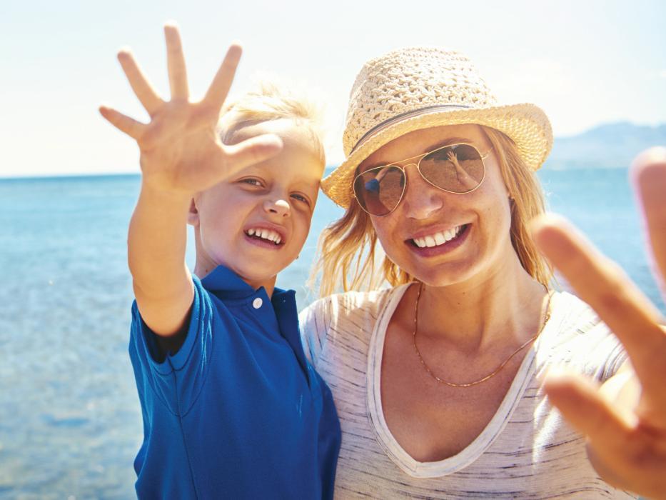 mother with son after cosmetic dentistry in foothill ranch