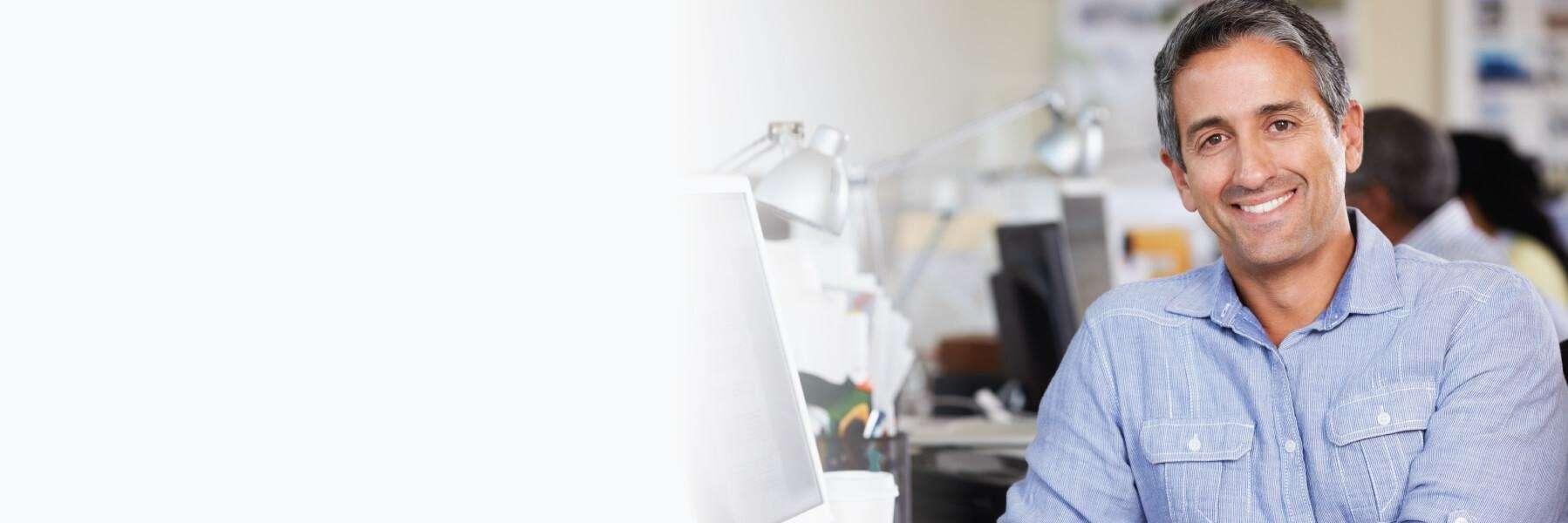 Man smiling at dentist for dentures in Foothill Ranch, CA