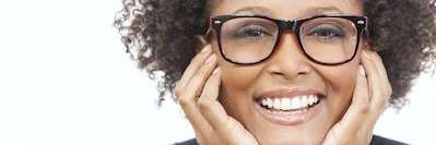 Middle aged black woman with glasses smiling, foothill ranch ca