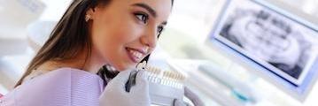 Woman at consultation for teeth whitening with cosmetic dentist in Lake Forest, CA