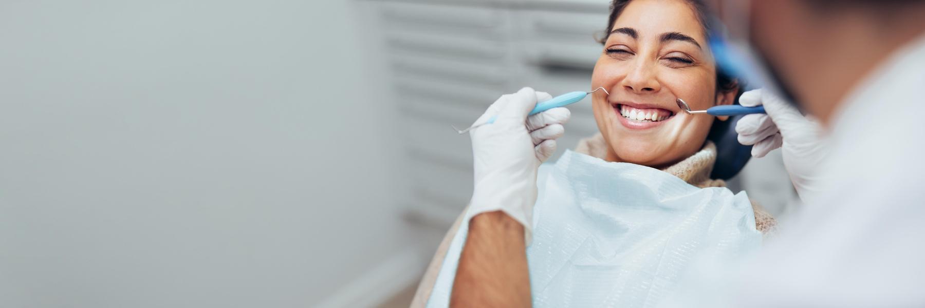 Patient smiling at appointment for dental implants in Lake Forest, CA