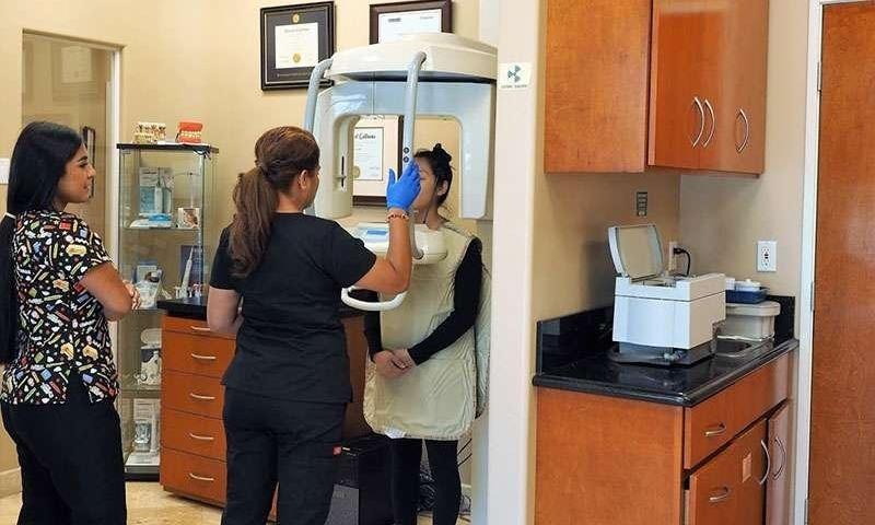 Patient getting dental x-ray at dentist office in Lake Forest CA